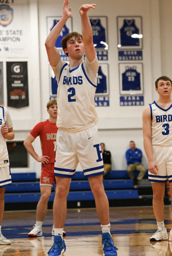 Nathan Rickard (11) shoots two after getting fouled. 